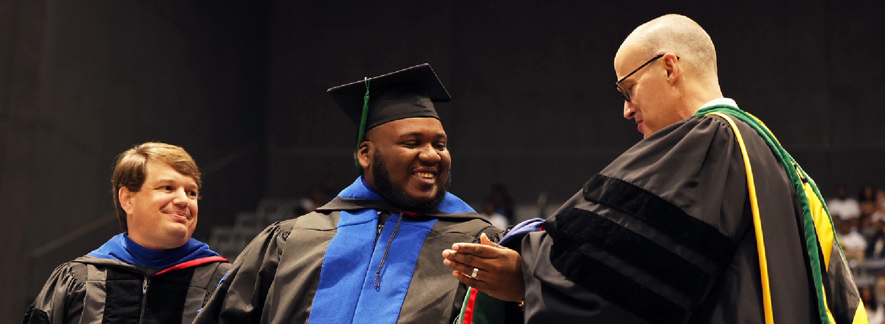 UMMC leaders congratulate graduate at commencement
